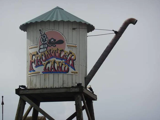 Advertising board for former Frontierland site.