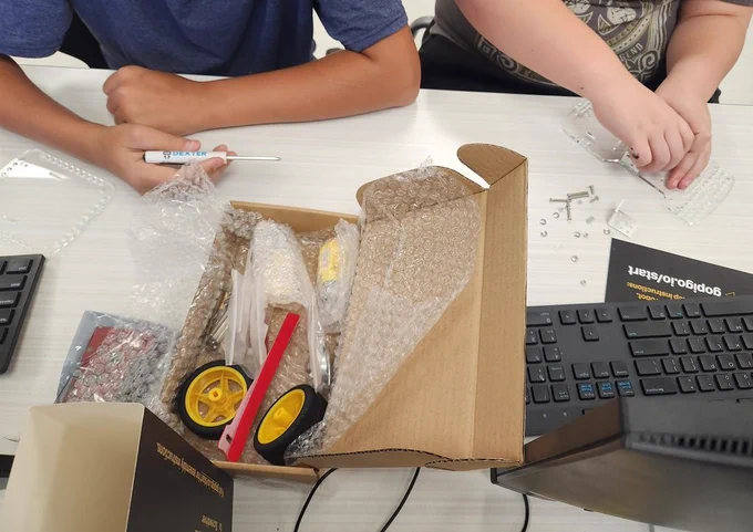 Students build and program robots to reinforce computer science concepts they have learned.