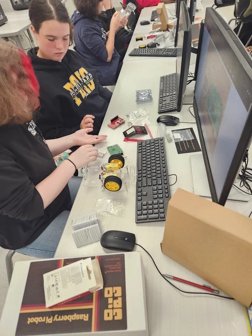 Students build and program robots to reinforce computer science concepts they have learned.