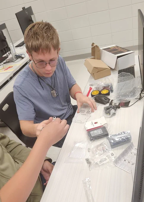 Students build and program robots to reinforce computer science concepts they have learned.