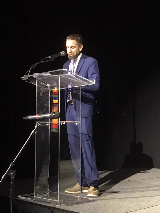 Bryan at podium