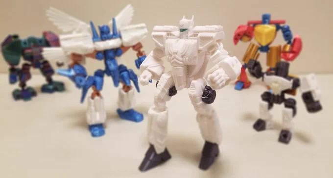 Several “BattleMecha” robot figurines posing to show the possibilities of the “PrintABlok” building bricks.