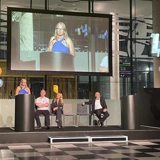 CEO Pippa Nightingale on stage