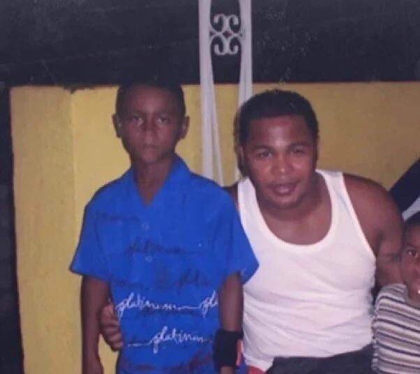 Andruw Jones and Ozzie Albies pose for a picture together approximately 20 years ago when Ozzie was a kid. 