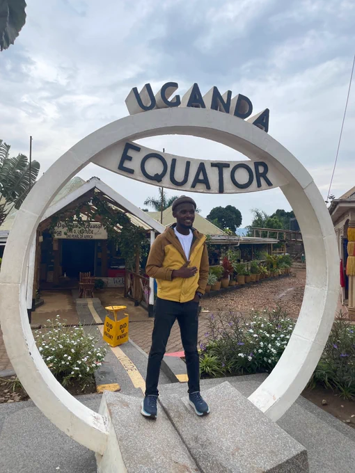 Collins at Uganda Equator along Kampala Masaka road 