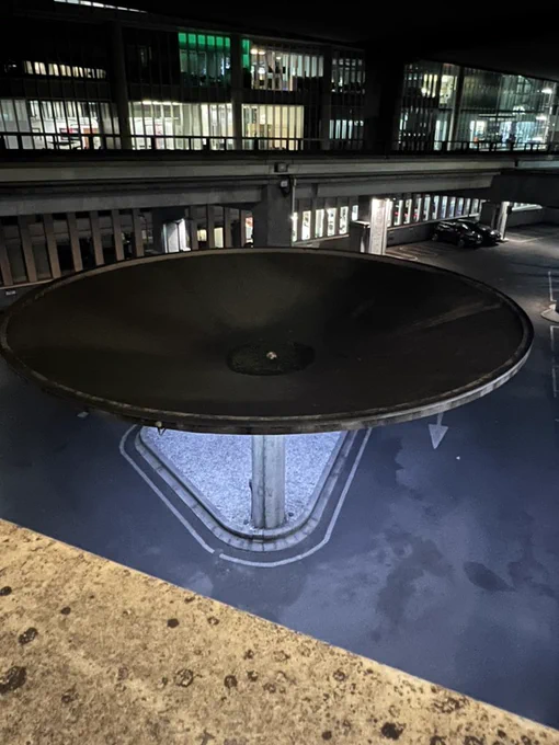 Football stuck in a huge circular bowl structure