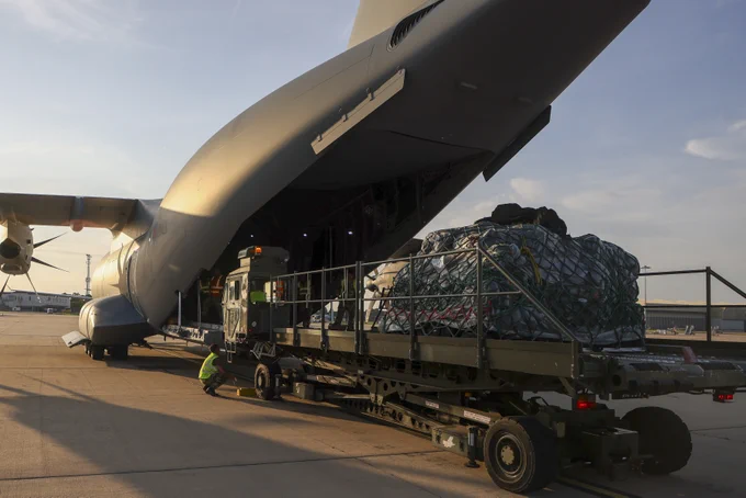 Image shows an RAF A400M Atlas on the ground being loaded with freight.