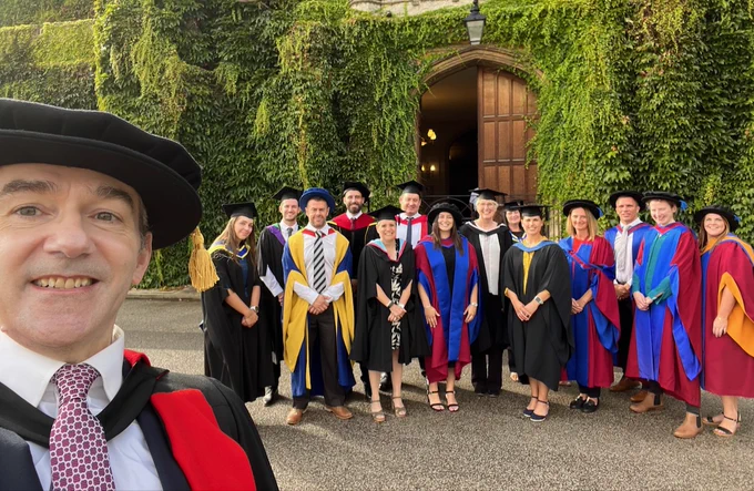 A selfie of the School of Sport & Exercise Science staff, in their academic robes, outside Lincoln Crown Court...as part of the graduation ceremonies at Lincoln Cathedral and Castle.
