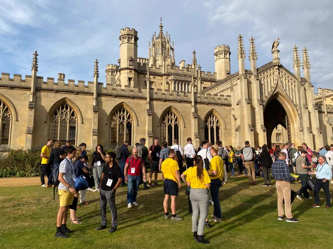 Attendees gather outside of St Johns College