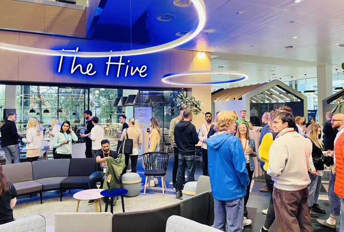 NUX event goers networking at the event space at Bupa Place.