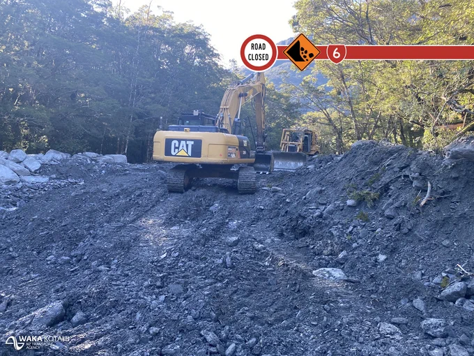 Crews working to remove over 20,000 cubic meters of slip material from the Muddy Creek bridge - 1
