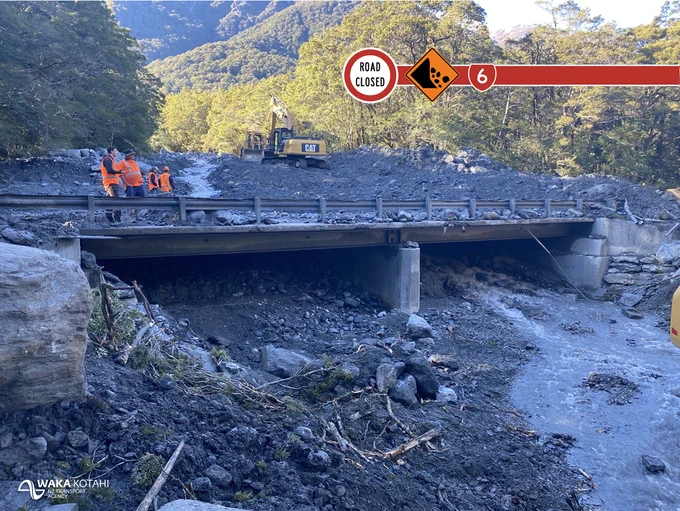 Crews working to remove over 20,000 cubic meters of slip material from the Muddy Creek bridge - 2