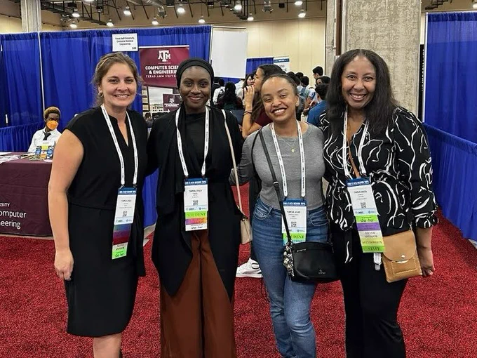 EECS staff Audrey Sillers (far left) and Tiffany Grimsley (far right)  with EECS PhD student Haifah Sambo (center left) and CS PhD student Hellina Nigatu (center right)