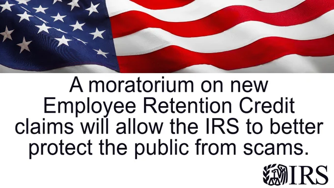 A waiving U.S. flag. IRS logo. Text: A moratorium on new Employee Retention Credit claims will allow the IRS to better protect the public from scams.