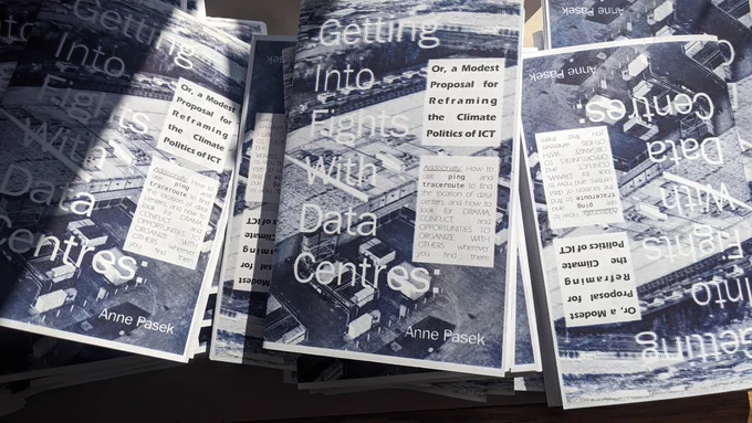 Print copies of my zine Getting Into Fights with Data Centers. The blue and black riso inks turned out nice and understated.