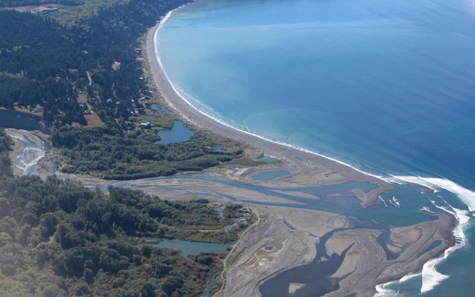 Aerial photograph of the mouth of the Elwha River in September 2016 showing sediment deposits from dam removal. Aerial assistance by LightHawk and plane piloted by Dr. Milton Bennett.