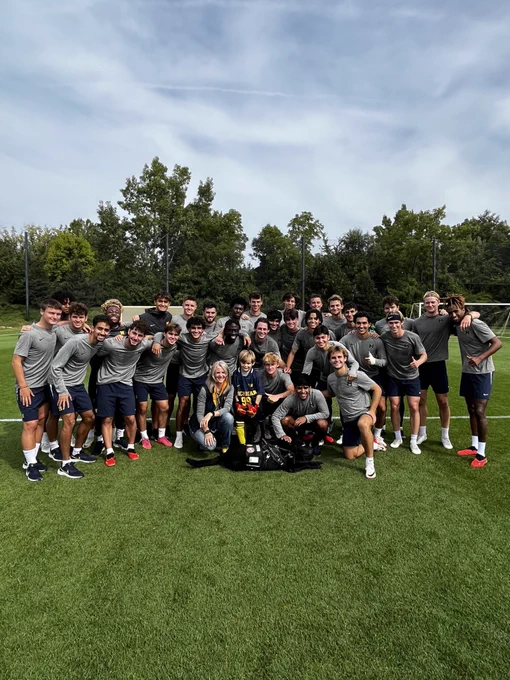 The whole team with Jaxon