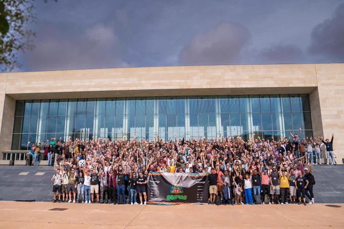 All the attendees of nsspain XI together on the stairs in front of the venue