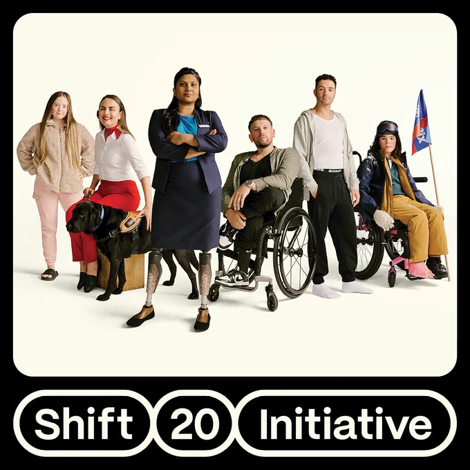 Six people with different disabilities posing for camera.