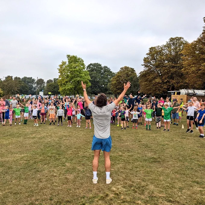 Joe Wicks doing the warm up at Laleham junior parkrun