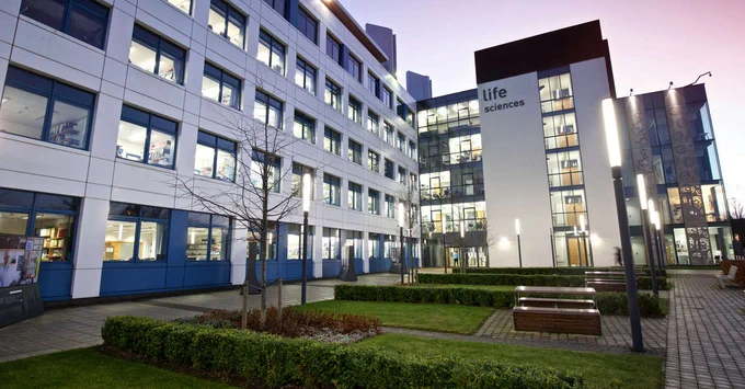 External 4 storey building at sunset. 