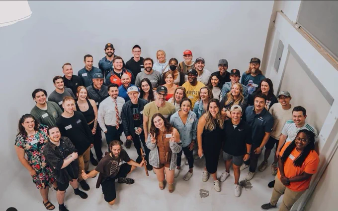 group of good looking sports creatives in a studio
