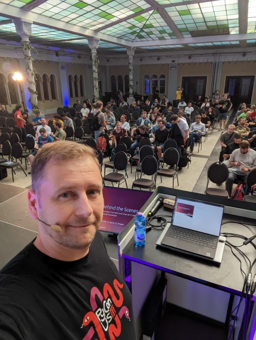Me on stage in front of a still filling audience, just minutes before my talk.