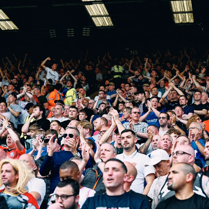 Blues fans in the away stand at Vicarage Road. 