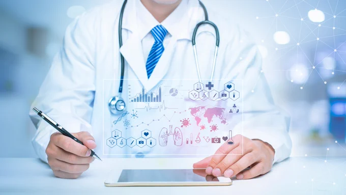 A doctor wearing a lab coat and a stethoscope is shown using a tablet, with a series of digital medical-related images hovering above it.