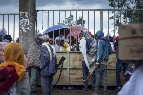 Displaced Ethiopians from different towns in the Amhara region wait for aid distributions at a center for the internally-displaced in Debark, in the Amhara region of northern Ethiopia August 26, 2021.