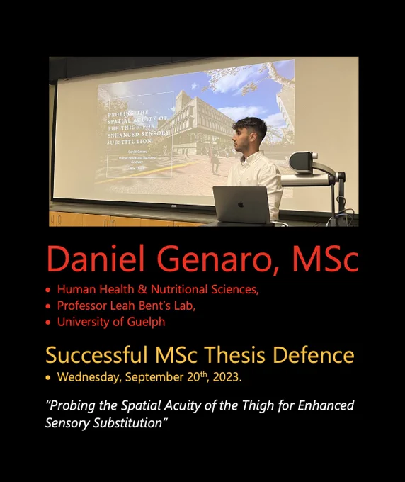 A photo of Ben at his defence, in front of a projected title screen with the same date and title of his thesis that is listed in this posting.