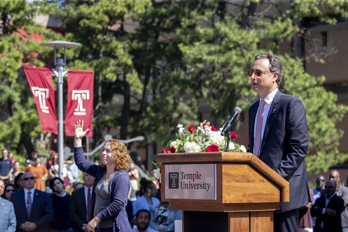 Provost Mandel speaking at a podium