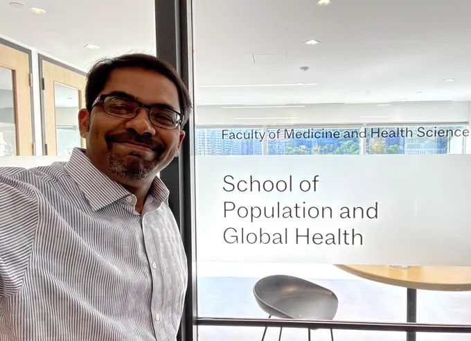 Dr. Madhu Pai posing for a selfie at the McGill School of Population and Global Health 
