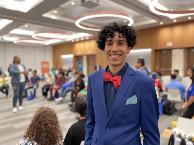 Student smiling at the camera.