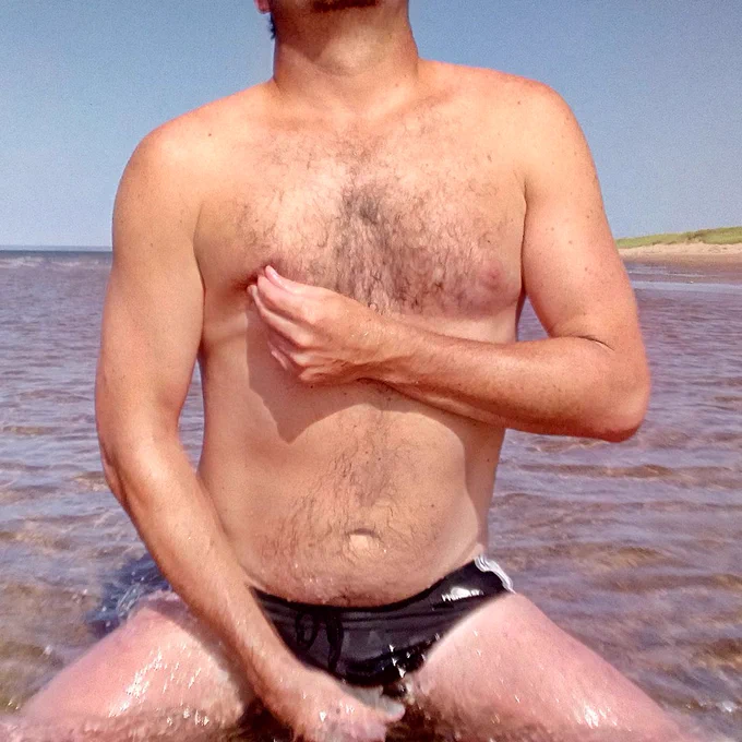 Jerking off in a pair of classic ADIDAS 3-stripe speedos at the beach... hoping someone would catch me.