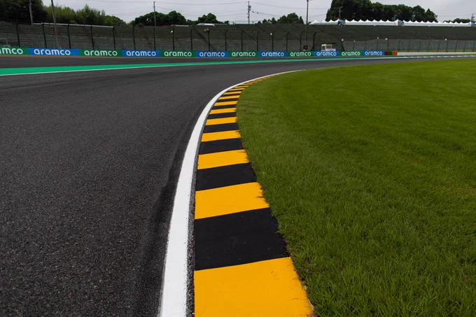 The kerbs at Turn 2, painted black and yellow