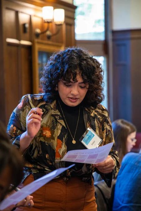 DivEx participant reads from a handout.