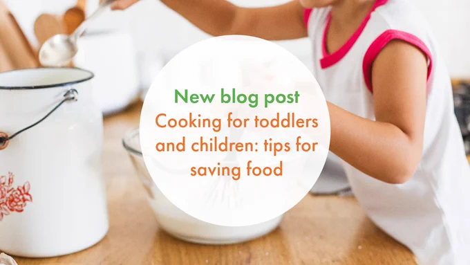 A young child spooning flour into a mixing bowl on a wooden surface. Overlaying this is a white-filled circle, central to the image with bold green and orange text that reads: "New blog post Cooking for toddlers and children: tips for saving food