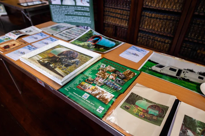 Photography, poster, artwork and fliers on display celebrating culture, art and creativity at the Traveller Equality and Justice community event. Image credit: Rubén Tapia/UCC.