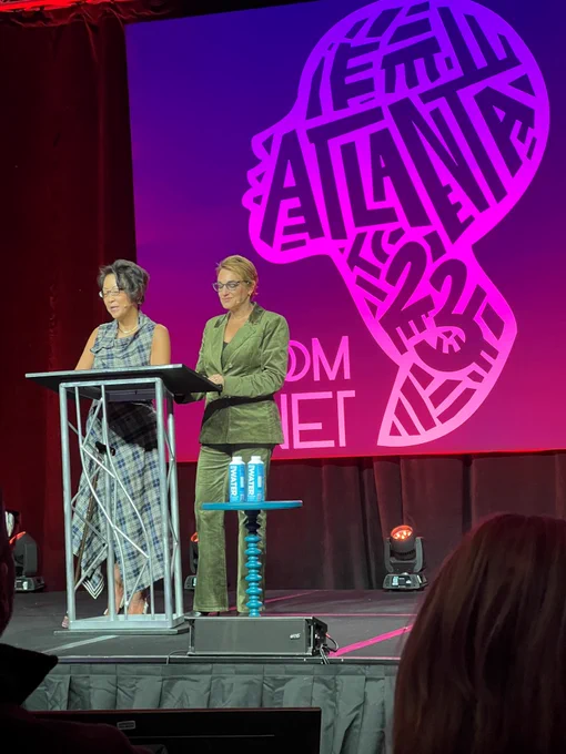 Whistleblower Aid’s Libby Liu and Naomi Seligman  deliver a case study keynote on their award-winning work on a stage at ComNet23 Atlanta.