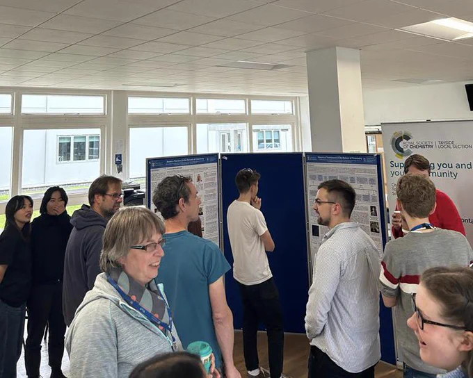 People mingling during the poster session