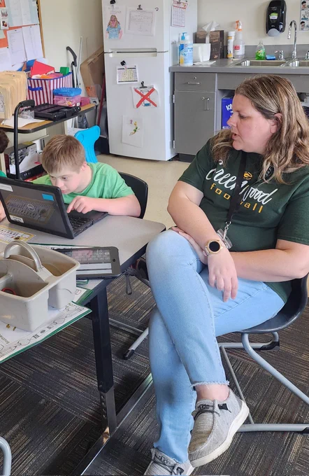 Students using computers to write