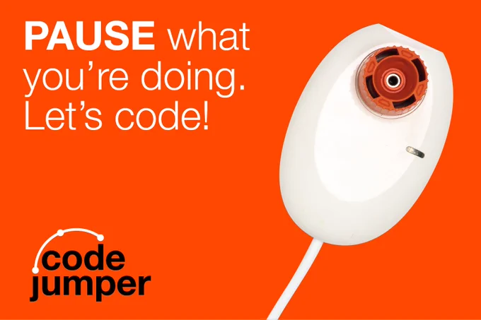 A white Code Jumper pod with a red dial on the top against a red background. Text: "PAUSE what you're doing. Let's code!" Code Jumper logo.