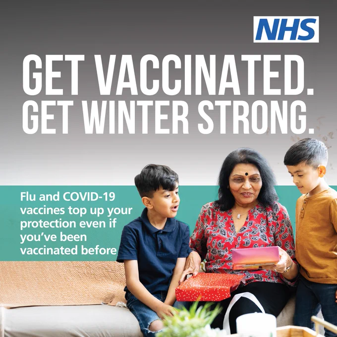Image: An older woman sits with her two grandchildren on either side of her whilst she opens presents. Text: Get vaccinated. Get winter strong. Flu and COVID-19 vaccines top up your protection even if you’ve been vaccinated before.