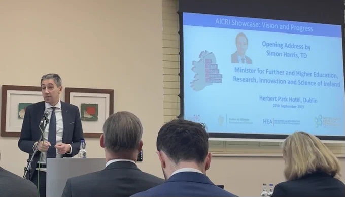 Minister Harris speaking at the AICRI showcase.
