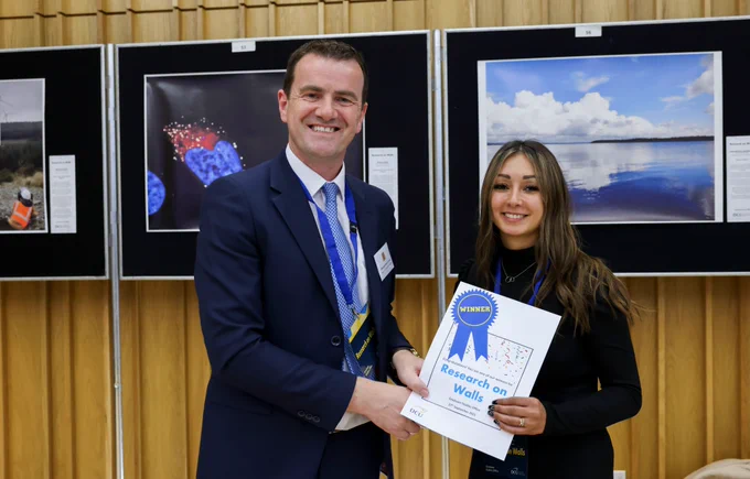 Melissa Lynch, Research on Walls winner pictured with Prof Joseph Stokes, Dean of Graduate Studies, DCU.