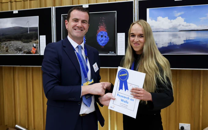 Martyna Bartusiak, Research on Walls winner pictured with Prof Joseph Stokes, Dean of Graduate Studies, DCU.