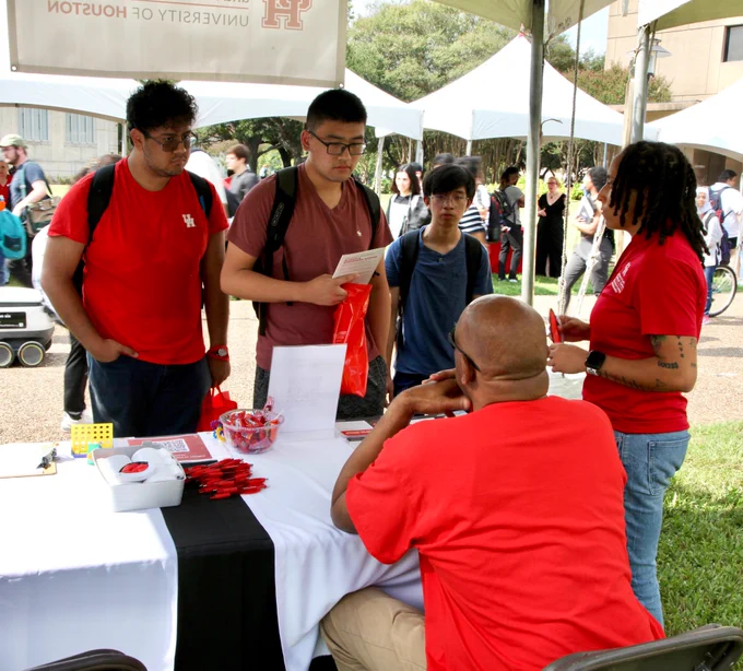 Students are getting their questions about graduate school answered at today's UH Graduate School Fair at Butler Plaza.