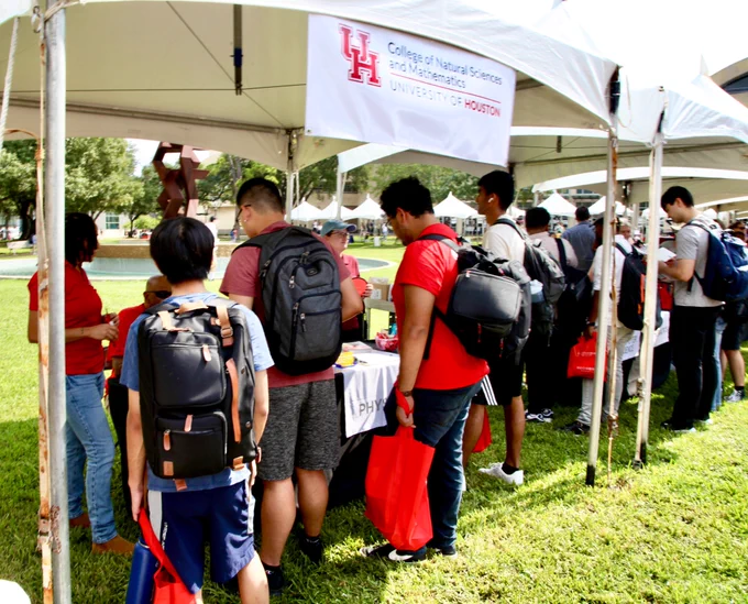 Students are getting their questions about graduate school answered at today's UH Graduate School Fair at Butler Plaza.