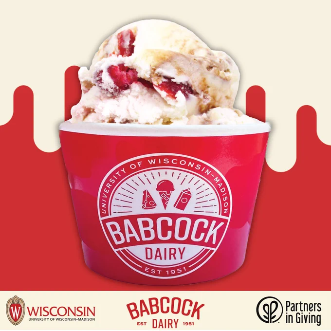 Cherry-flavored ice cream with Door County cherries and a fudge swirl in front of a red and cream background with the UW-Madison, Babcock Dairy and Partners in Giving logos.